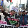 -3월 23일 오후 집회를 마친 참가자들이 광화문에서 출발해 명동을 지나 주한 이스라엘 대사관 앞까지 행진하고 있다.